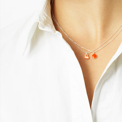 Sign necklace with pendant. Neon orange. Sterling silver. Scherning Copenhagen