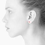 Sign Heart nano earrings. Neon red orange. Sterling silver. Scherning Copenhagen