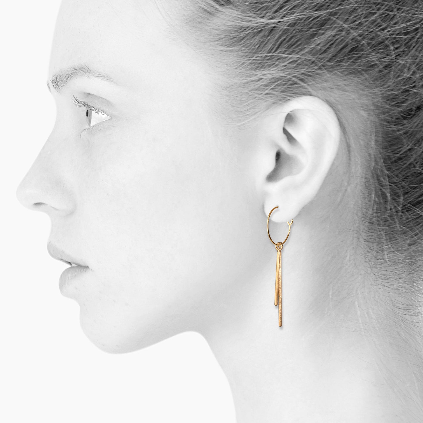 Lee dangle duo. Creole earrings. Gold-plated sterling silver. Scherning Copenhagen